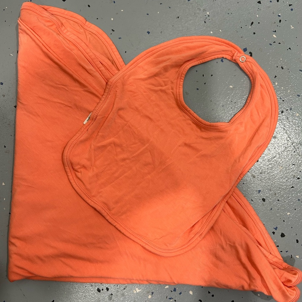 NWOT Kate Quinn blanket and bib set. Coral colors